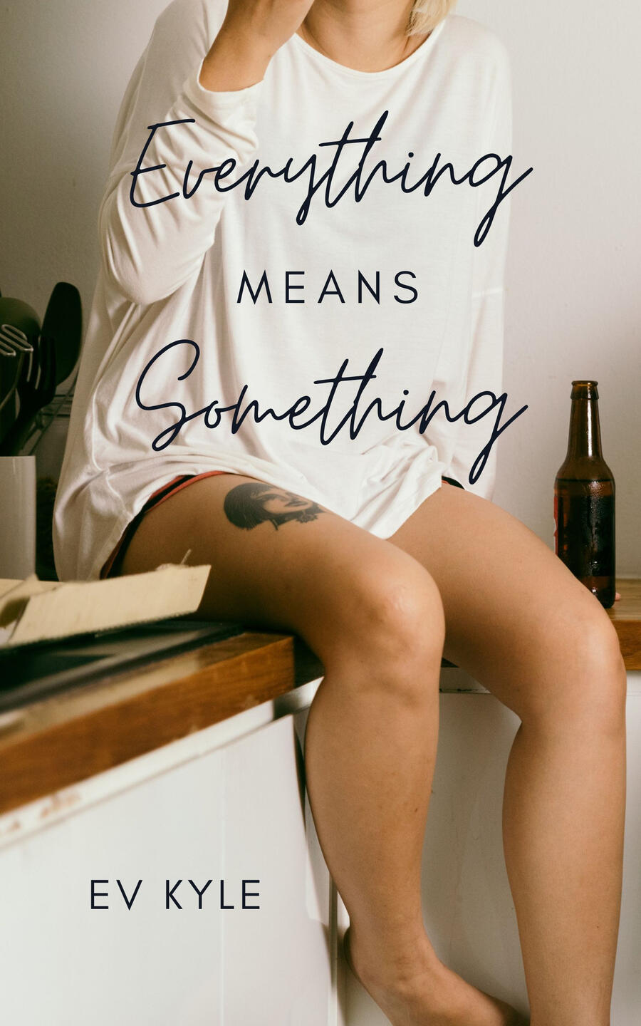A book cover for "Everything Means Something" by EV Kyle featuring a person lying facedown on a white sheet.